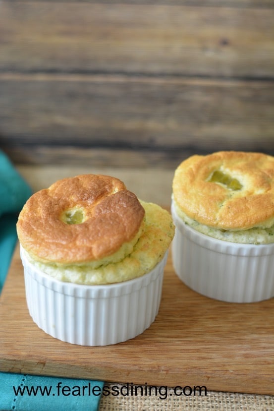 2 ramekins with broccoli and cheese gluten free souffle.